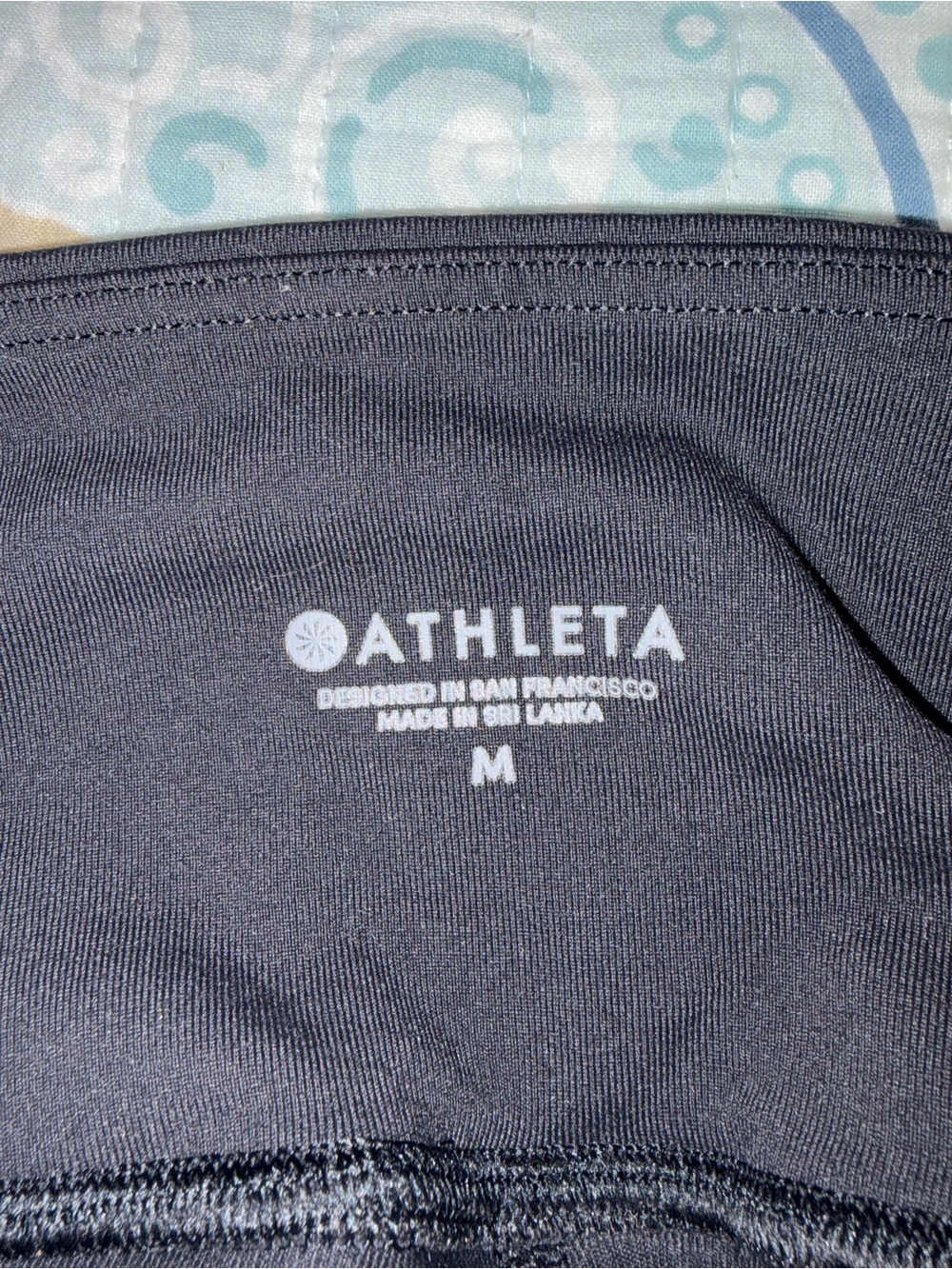 Athleta Black Performance legging with skirt on top